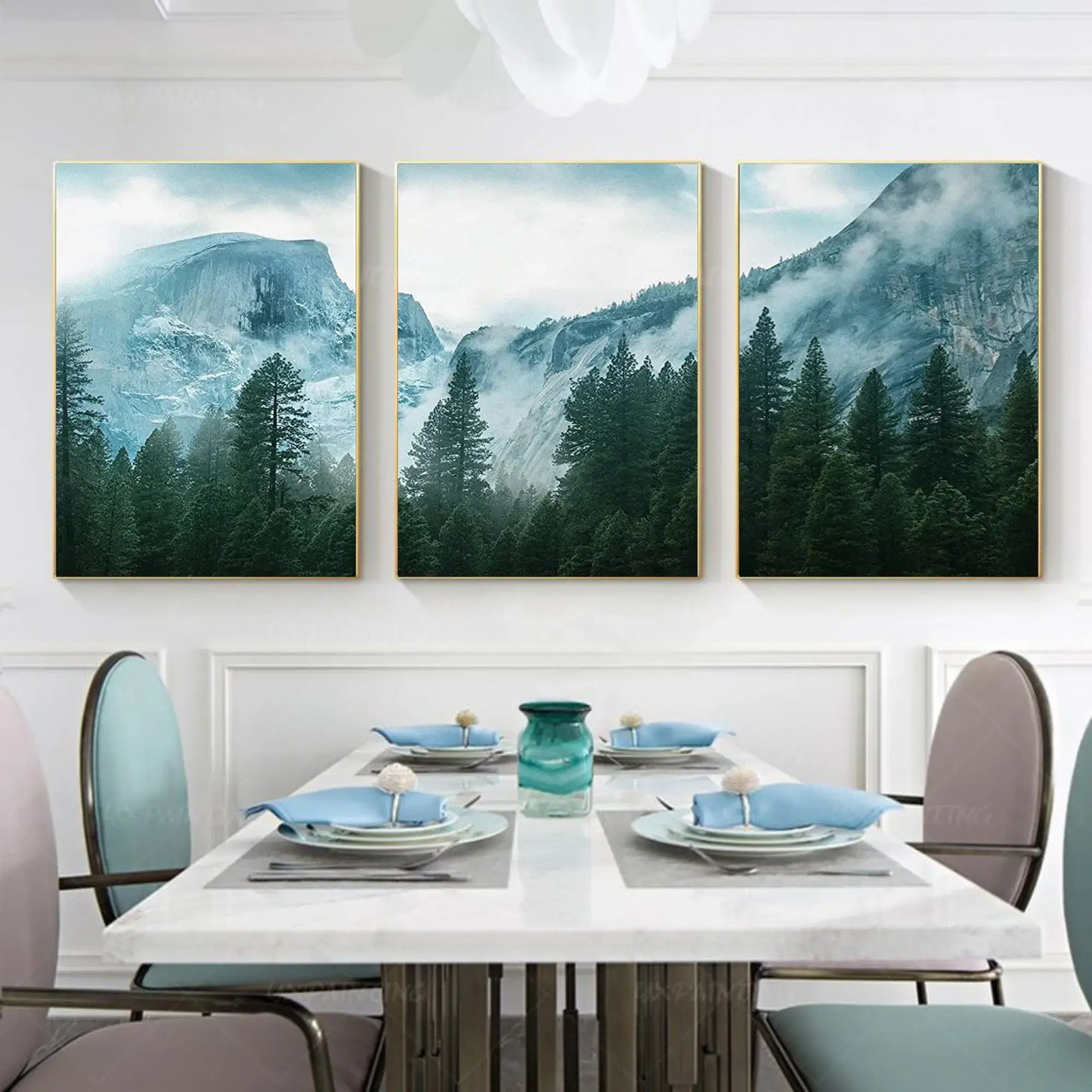 Dining room with a mountain-themed wall art set above a table.