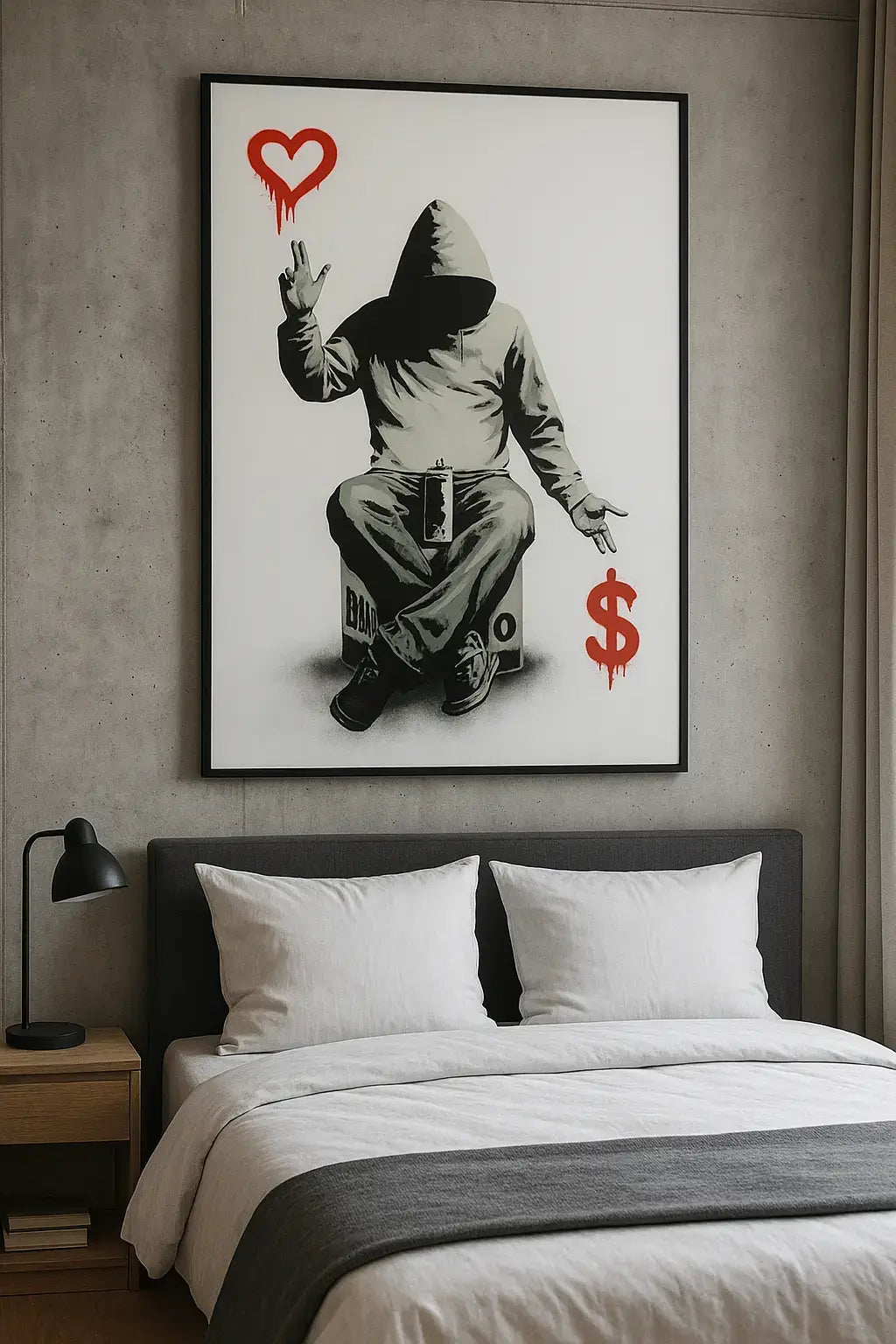 Bedroom with a framed artwork of a person in a hoodie with heart and dollar sign symbols.