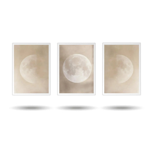 Three framed prints of a moon phases series on a white background