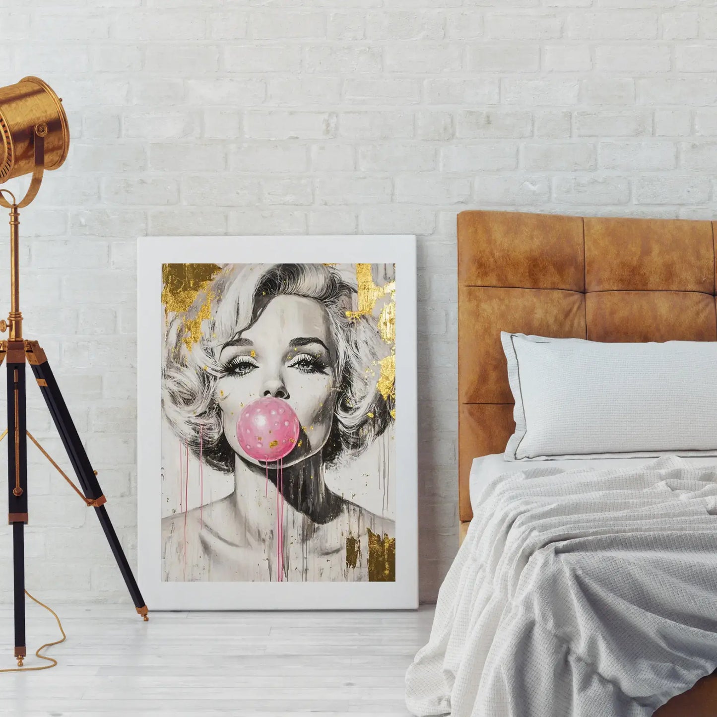 Framed artwork of a woman with a pink bubble gum bubble in a bedroom setting.