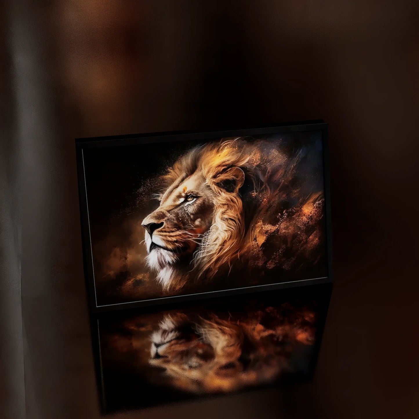 Framed artwork of a lion's head on a dark background