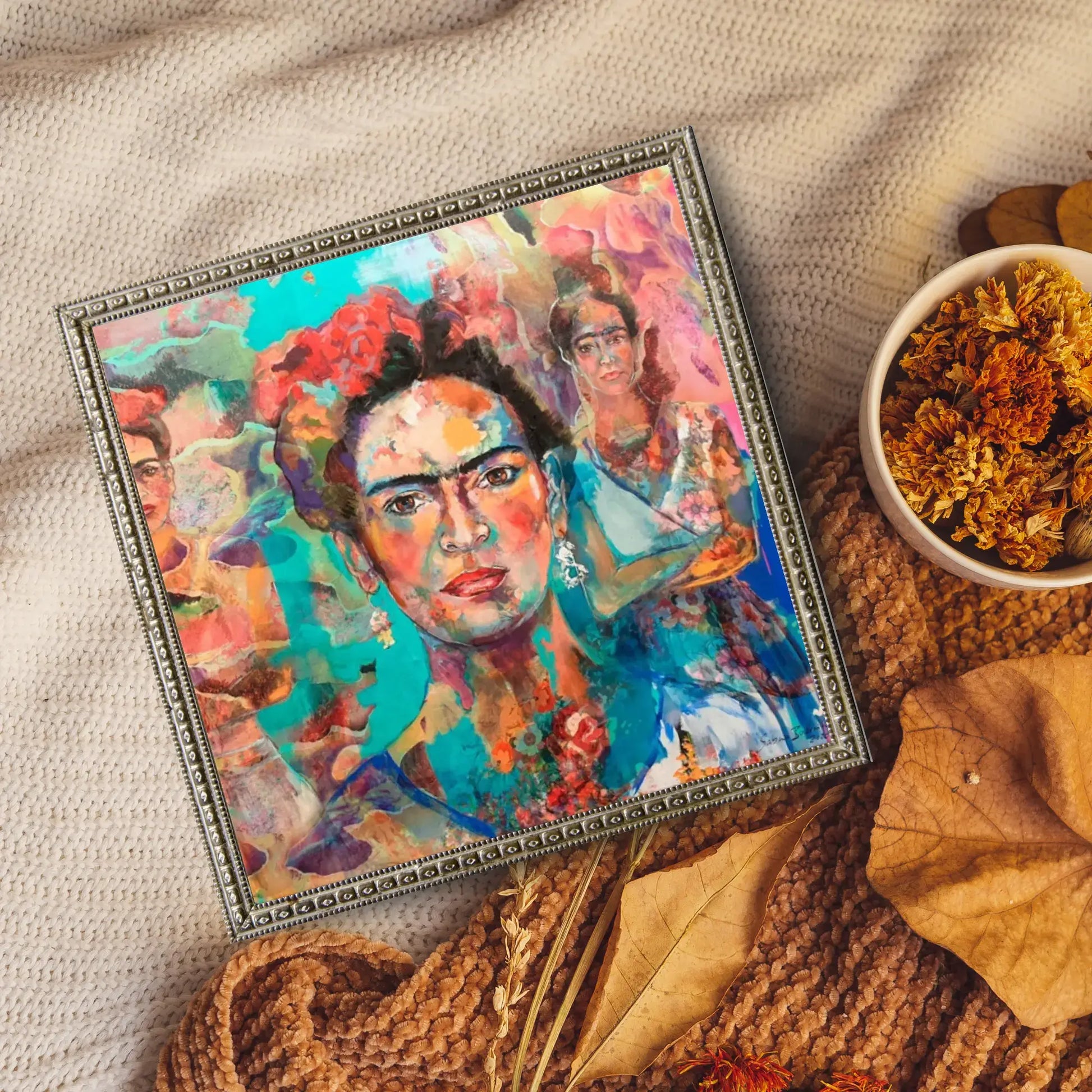 Colorful painting of a woman with decorative frame on a textured surface with flowers.