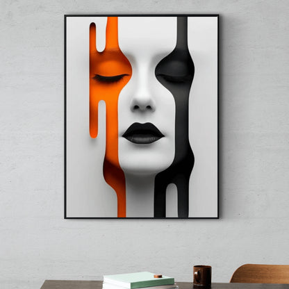 Abstract art print of a face with orange, black, and white colors on a gray wall.