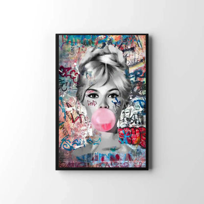 Framed artwork of a woman blowing a bubble with gum against a colorful graffiti background.
